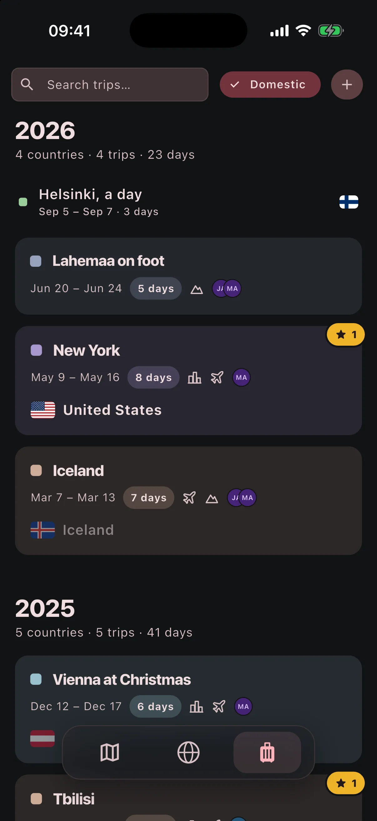 Trips grouped by year on the phone, each with its dates, countries and tags